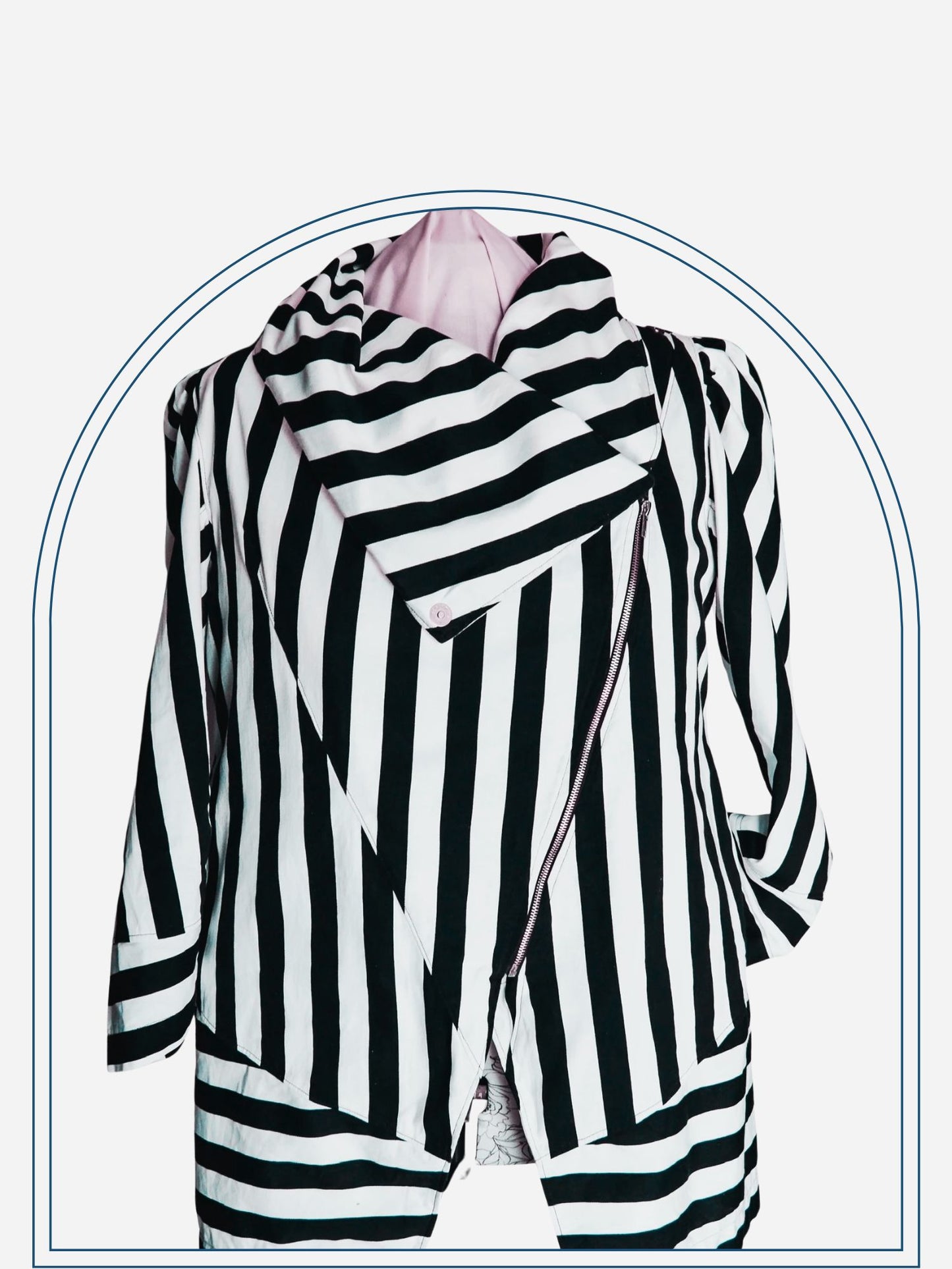 A black and white striped custom-made jacket displayed on a mannequin.